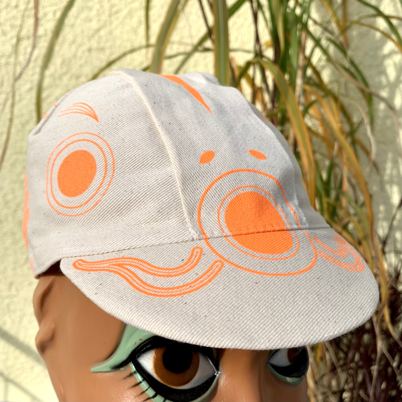 neon orange color print on undyed fabric Koinobori cycling cap