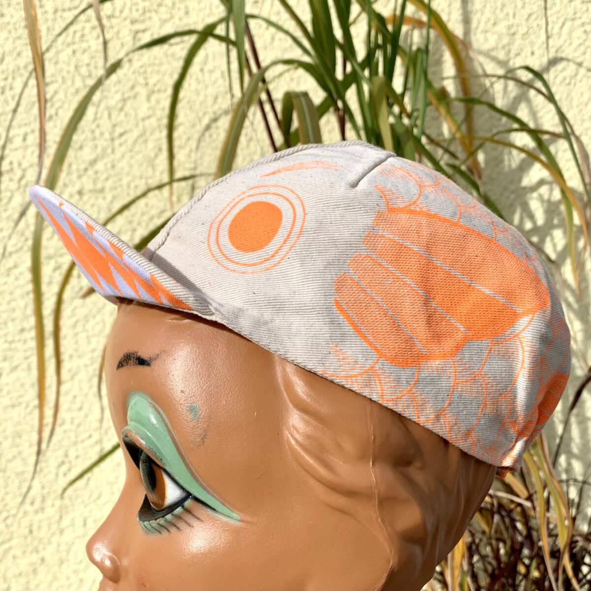 neon orange color print on undyed fabric Koinobori cycling cap