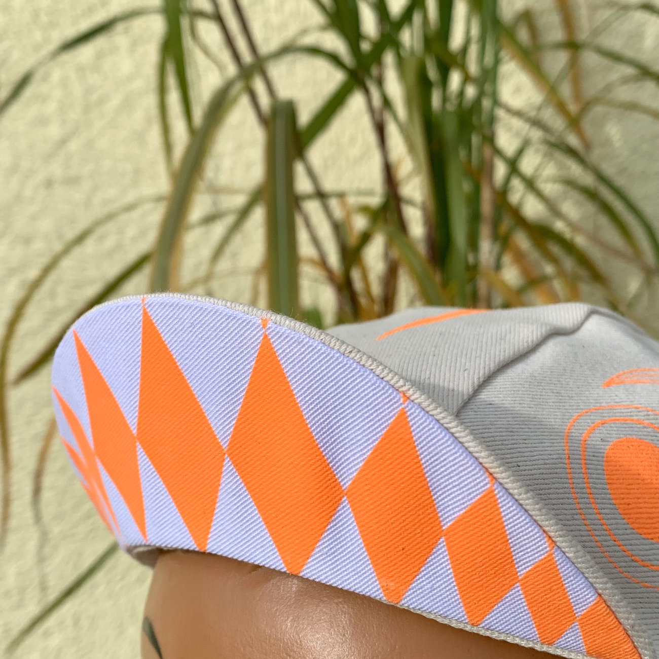 neon orange color print on undyed fabric Koinobori cycling cap