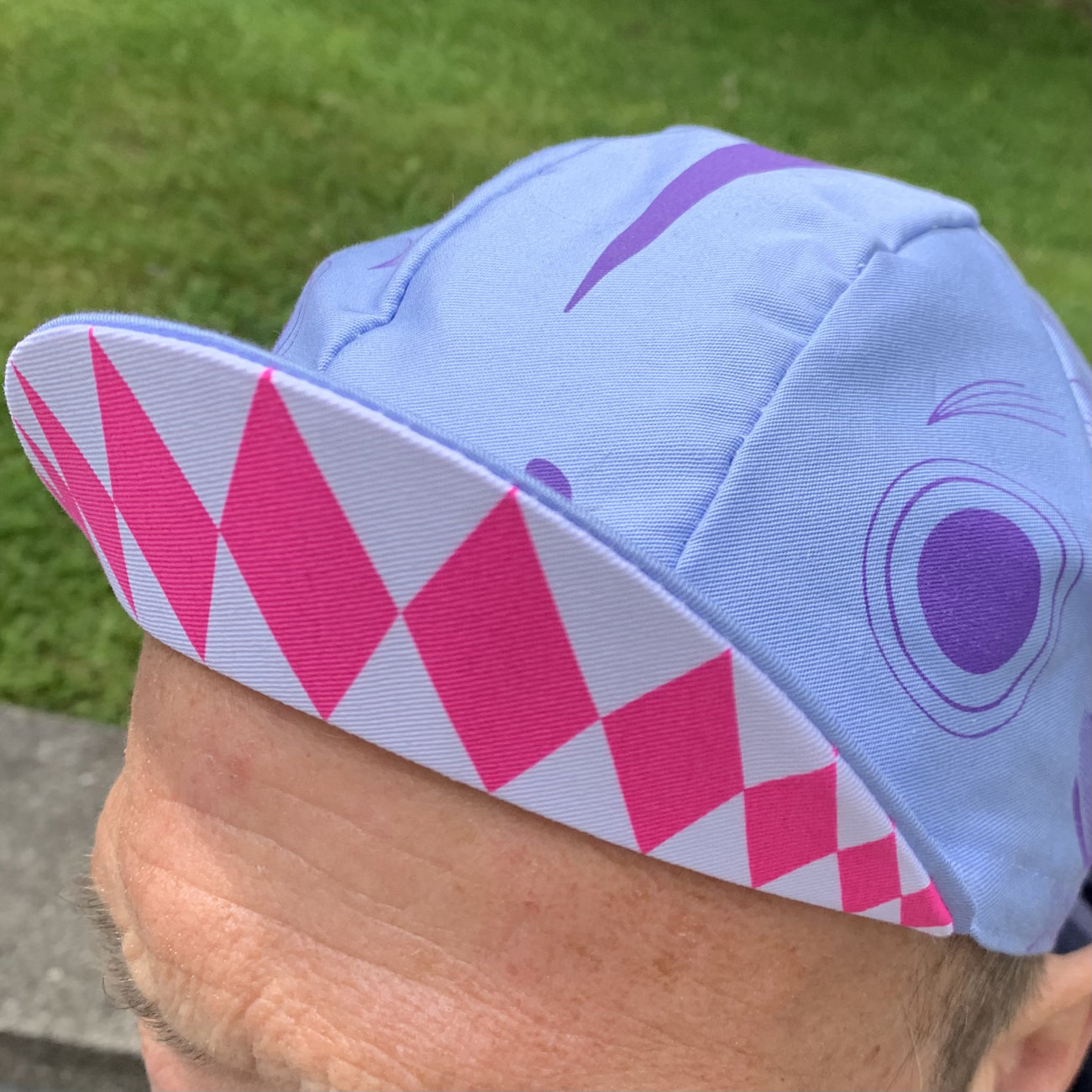 light blue, purple and neon pink Koinobori cycling cap